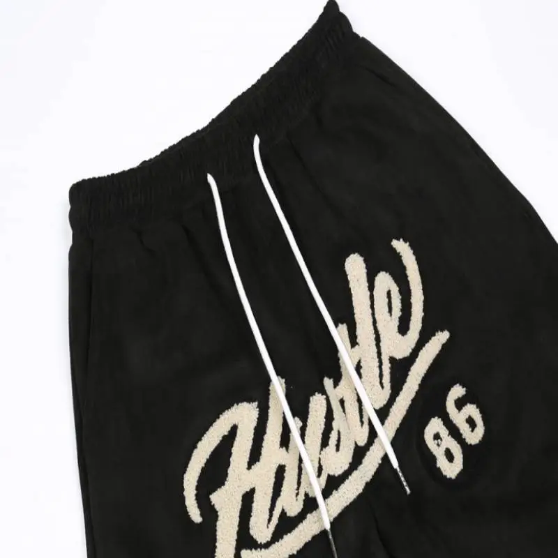Embroidered Letters Leather Splicing Casual Pants-4